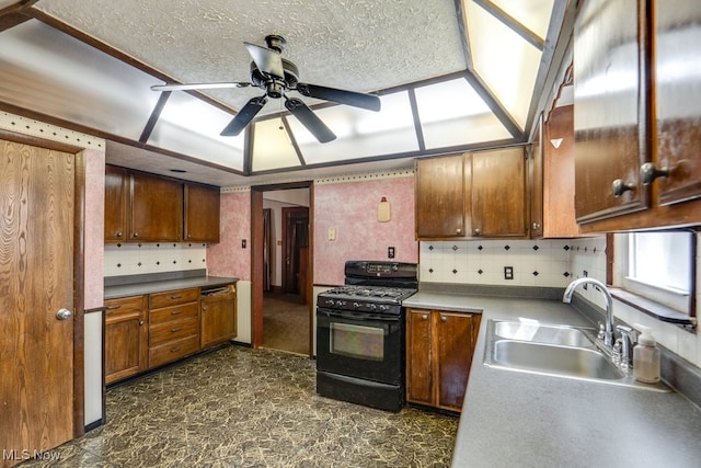 516 Floyd St, Akron, OH 44310 - kitchen featuring black range with gas cooktop, ceiling fan, brown cabinets, tasteful backsplash, and wallpapered walls