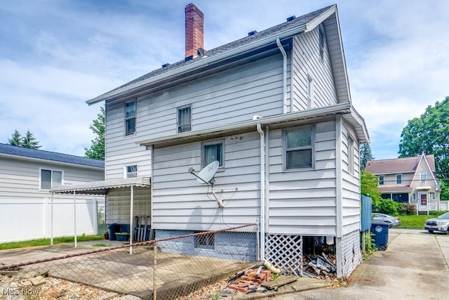 516 Floyd St, Akron, OH 44310 - back of house with a chimney