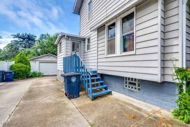 516 Floyd St, Akron, OH 44310 - view of home's exterior with an outbuilding and a garage