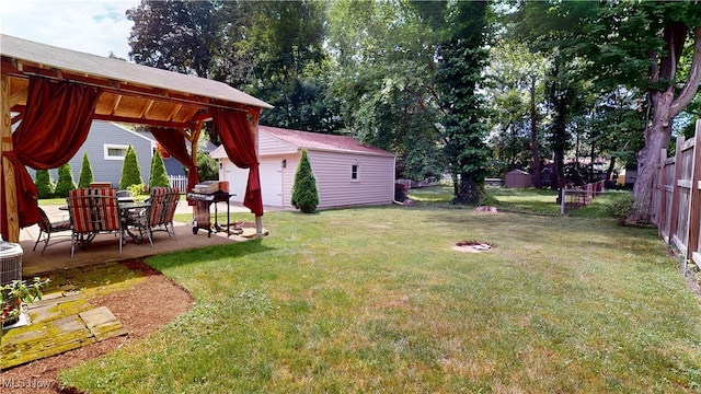 3162 W 231st St, North Olmsted, OH 44070 - view of yard featuring a patio and an outdoor structure