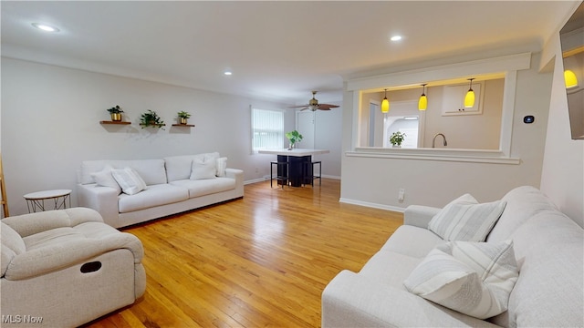 3162 W 231st St, North Olmsted, OH 44070 - living room featuring light wood-style flooring, ceiling fan, and recessed lighting