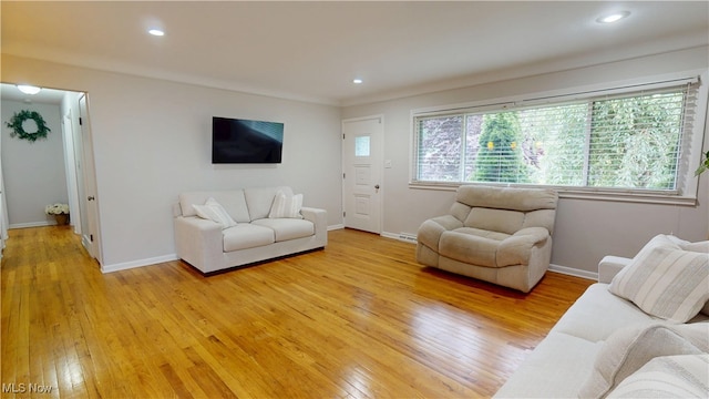 3162 W 231st St, North Olmsted, OH 44070 - living area featuring light wood finished floors and recessed lighting