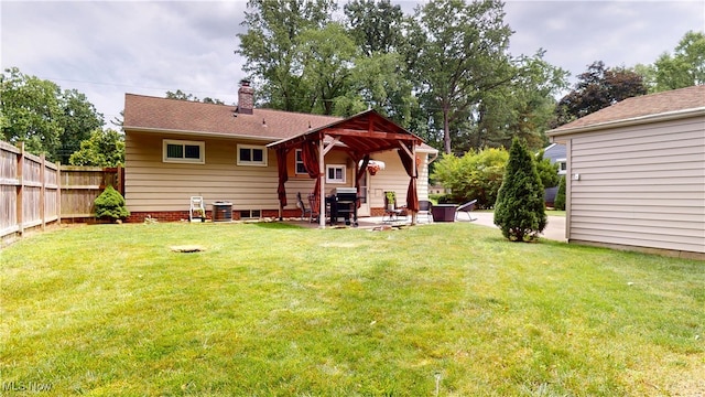 3162 W 231st St, North Olmsted, OH 44070 - rear view of house featuring a patio area and a chimney
