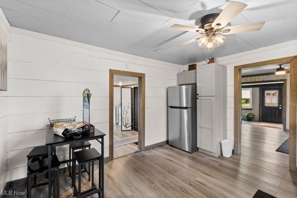 345 Ritchie Ave, Weirton, WV 26062 - kitchen with freestanding refrigerator, a ceiling fan, and light wood-style floors