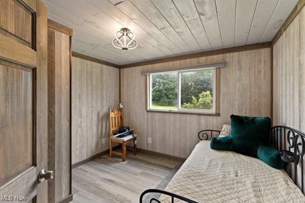 345 Ritchie Ave, Weirton, WV 26062 - living area featuring light wood finished floors, wood ceiling, and wooden walls