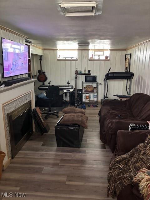 1129 Avondale Rd, South Euclid, OH 44121 - living room with wood finished floors and a glass covered fireplace