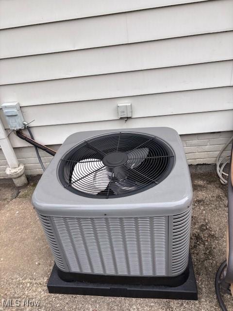 1129 Avondale Rd, South Euclid, OH 44121 - exterior view of a central AC unit