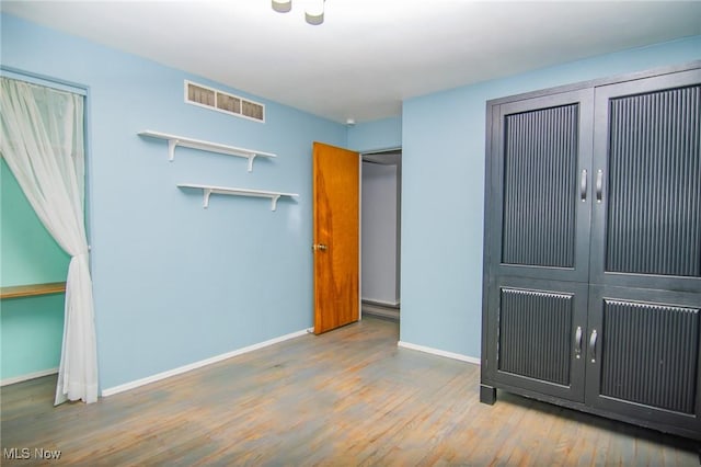 1333 Overlook Dr, Weirton, WV 26062 - unfurnished bedroom with baseboards and wood finished floors