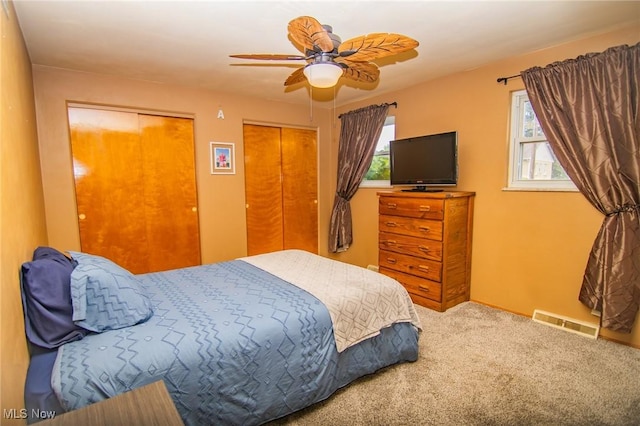 1333 Overlook Dr, Weirton, WV 26062 - bedroom featuring carpet floors, two closets, and ceiling fan