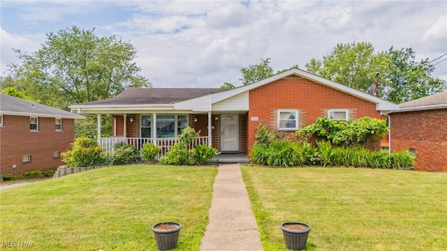 1333 Overlook Dr, Weirton, WV 26062 - view of front of home with brick siding, a front yard, and covered porch