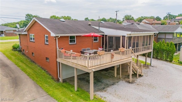 1333 Overlook Dr, Weirton, WV 26062 - rear view of property featuring a sunroom, a deck, brick siding, a shingled roof, and stairway