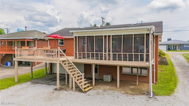 1333 Overlook Dr, Weirton, WV 26062 - rear view of property with a sunroom, stairway, brick siding, a deck, and a carport