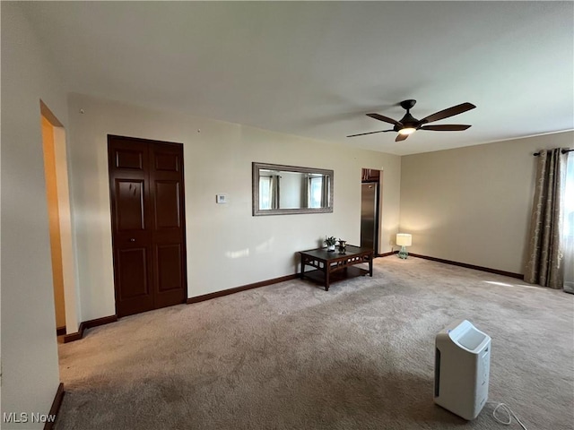 484 Louella Ave, Chester, WV 26034 - empty room featuring light colored carpet and a ceiling fan