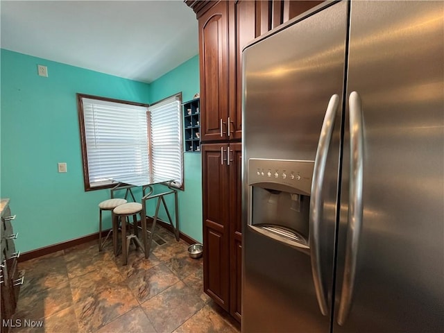 484 Louella Ave, Chester, WV 26034 - kitchen with stainless steel fridge with ice dispenser and dark stone finish floors