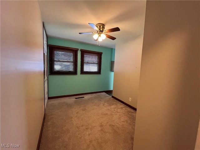 484 Louella Ave, Chester, WV 26034 - spare room with ceiling fan and carpet flooring
