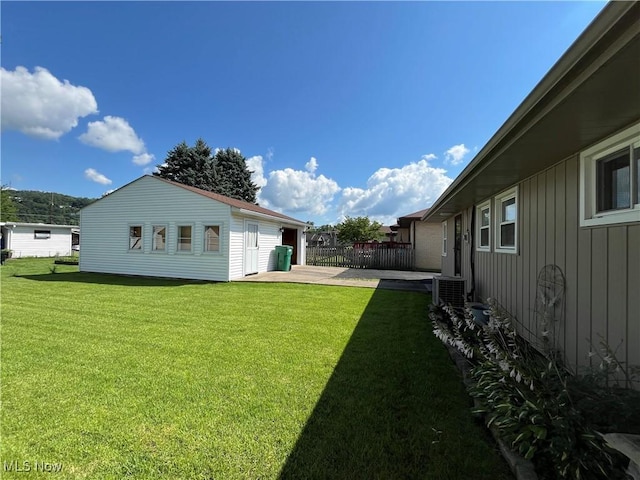 484 Louella Ave, Chester, WV 26034 - view of green lawn with a patio area and concrete driveway