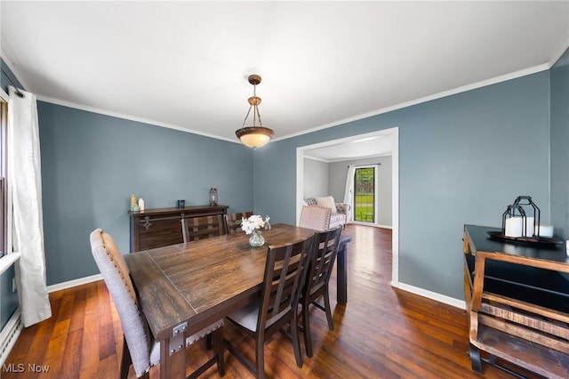 1141 Las Olas Blvd NW, North Canton, OH 44720 - dining space with wood finished floors and crown molding