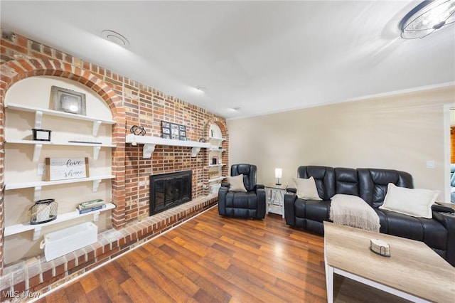 1141 Las Olas Blvd NW, North Canton, OH 44720 - living area featuring wood finished floors and a fireplace