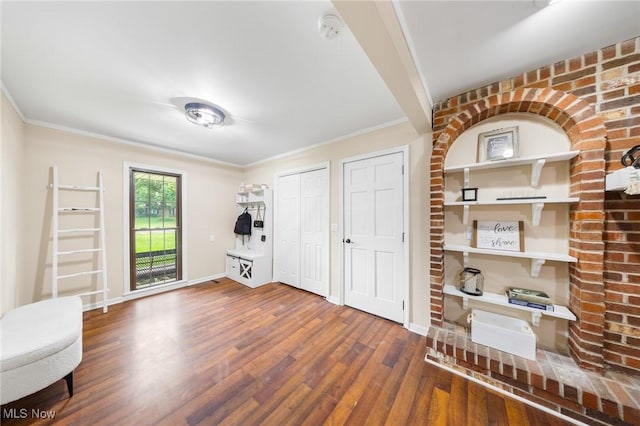 1141 Las Olas Blvd NW, North Canton, OH 44720 - living area featuring wood finished floors and crown molding