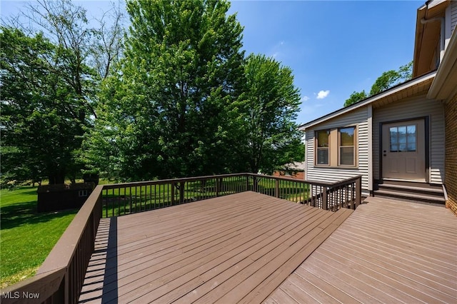 1141 Las Olas Blvd NW, North Canton, OH 44720 - wooden deck with a lawn