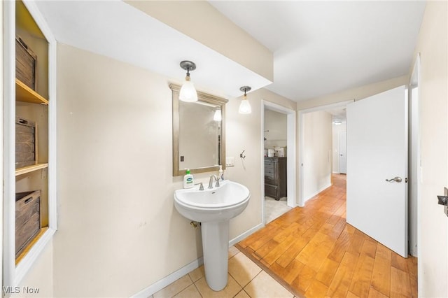 1141 Las Olas Blvd NW, North Canton, OH 44720 - bathroom with tile patterned flooring and a sink