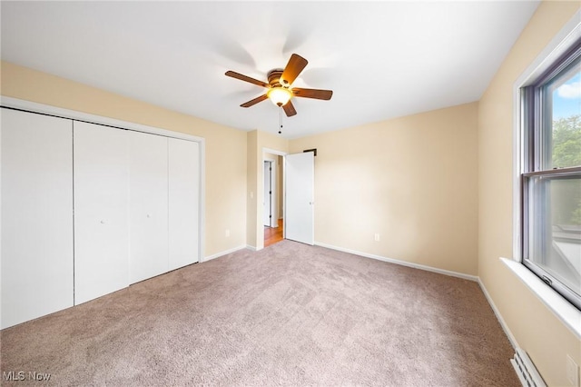 1141 Las Olas Blvd NW, North Canton, OH 44720 - unfurnished bedroom featuring carpet floors, a closet, and a ceiling fan