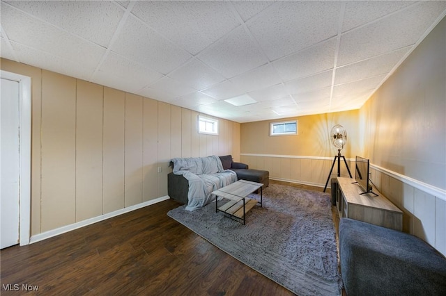 1141 Las Olas Blvd NW, North Canton, OH 44720 - living area featuring a paneled ceiling, wood finished floors, and a decorative wall