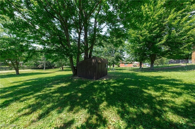 1141 Las Olas Blvd NW, North Canton, OH 44720 - view of yard featuring a storage shed