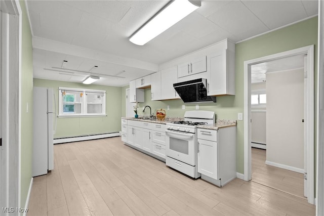 1170 Moneta Ave, Aurora, OH 44202 - kitchen with white appliances, a baseboard heating unit, white cabinets, and light wood-type flooring