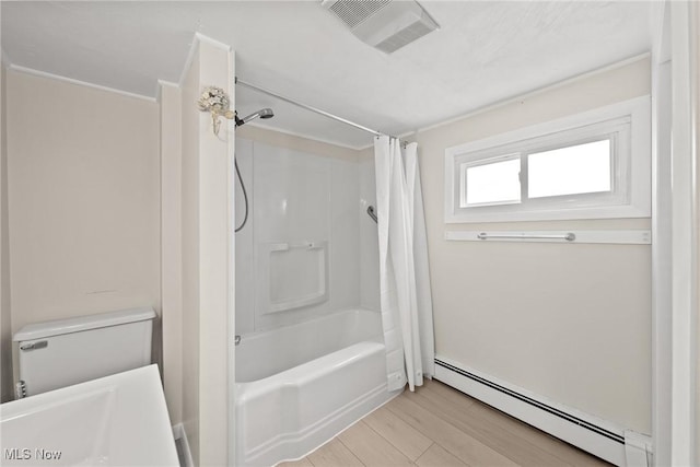 1170 Moneta Ave, Aurora, OH 44202 - full bath featuring a baseboard radiator, shower / bath combination with curtain, and wood finished floors