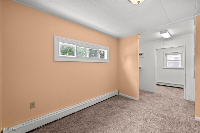 1170 Moneta Ave, Aurora, OH 44202 - carpeted spare room featuring a baseboard radiator and healthy amount of natural light