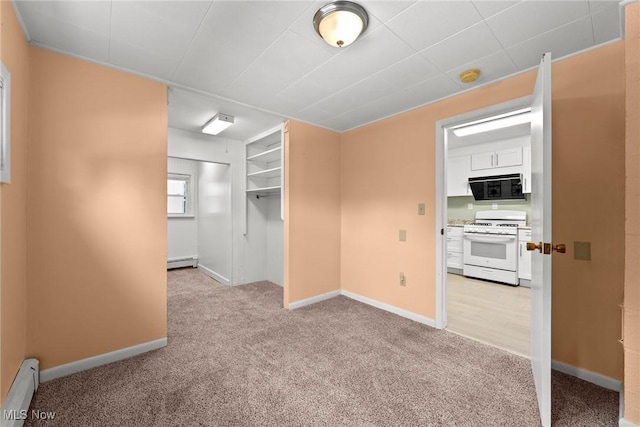 1170 Moneta Ave, Aurora, OH 44202 - unfurnished room featuring baseboard heating, a baseboard radiator, light carpet, and a smoke detector