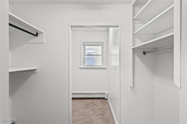 1170 Moneta Ave, Aurora, OH 44202 - walk in closet featuring baseboard heating