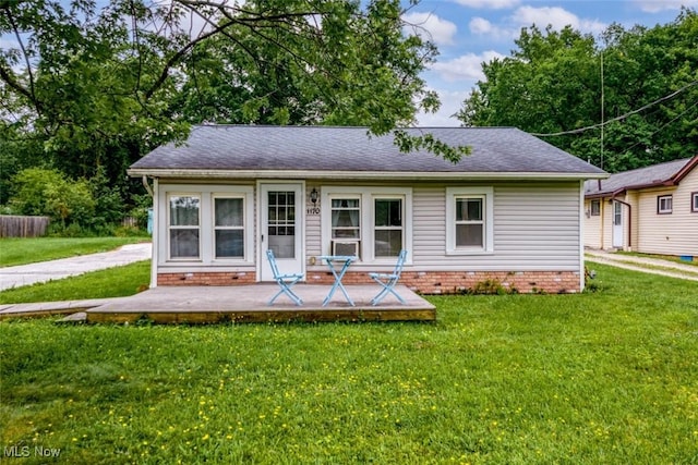 1170 Moneta Ave, Aurora, OH 44202 - rear view of property featuring a yard and a shingled roof