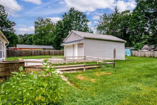 1170 Moneta Ave, Aurora, OH 44202 - view of yard featuring an outdoor structure and a garage