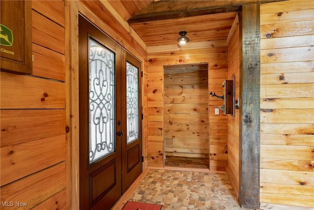 4278 Newbury Rd, Little Hocking, OH 45742 - entryway with wooden walls, light stone finish floors, and wood ceiling