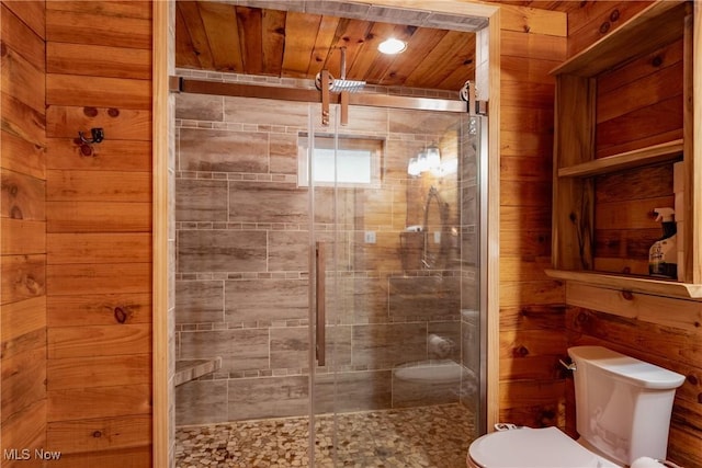 4278 Newbury Rd, Little Hocking, OH 45742 - bathroom featuring a stall shower, wood ceiling, and wooden walls