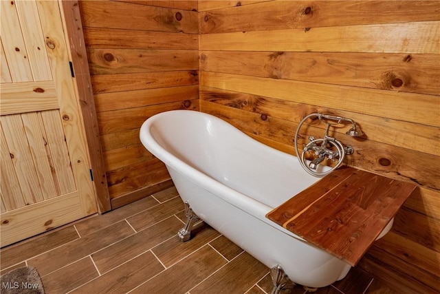 4278 Newbury Rd, Little Hocking, OH 45742 - full bathroom with a freestanding tub and wood finish floors