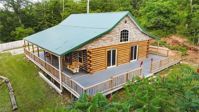 4278 Newbury Rd, Little Hocking, OH 45742 - back of property with log exterior, a wooden deck, stone siding, and a metal roof