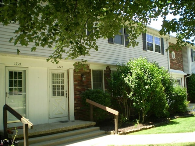 1222 N Carpenter Rd, Brunswick, OH 44212 - view of front of home featuring brick siding