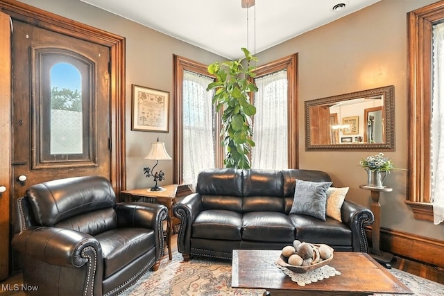 7298 Akron Rd, Sterling, OH 44276 - living area featuring plenty of natural light and light wood-style floors