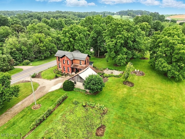 7298 Akron Rd, Sterling, OH 44276 - aerial view of property and surrounding area featuring a heavily wooded area