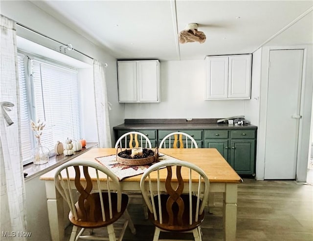 121 Yorktown Dr, Wintersville, OH 43953 - dining area featuring healthy amount of natural light and wood finished floors