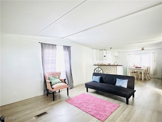 121 Yorktown Dr, Wintersville, OH 43953 - living area with light wood finished floors and lofted ceiling