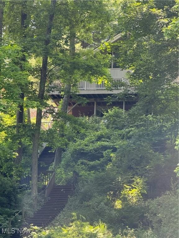 2650 W Buckhorn Dr Unit 823, Millersburg, OH 44654 - exterior space with a wooded view