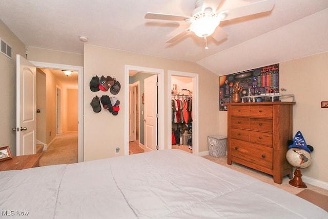 7149 Cascade Creek Ln, Independence, OH 44131 - carpeted bedroom featuring a walk in closet, ceiling fan, and a closet
