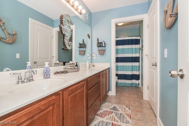 7149 Cascade Creek Ln, Independence, OH 44131 - bathroom with double vanity, tile patterned floors, and curtained shower