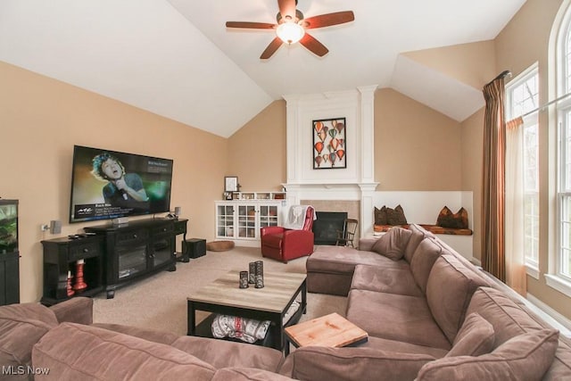 7149 Cascade Creek Ln, Independence, OH 44131 - carpeted living room with a ceiling fan, lofted ceiling, and a fireplace