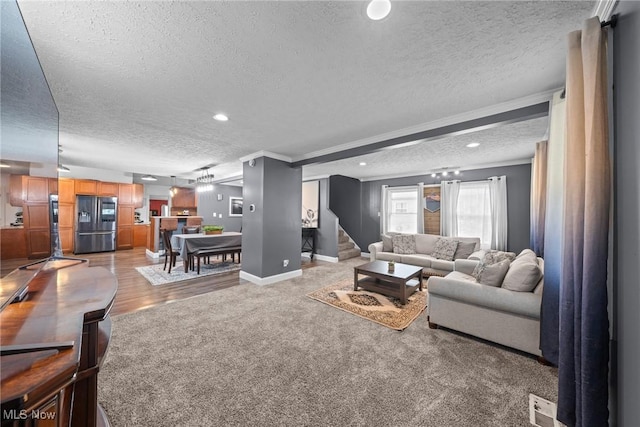 208 Clark St, Berea, OH 44017 - living room featuring a textured ceiling, crown molding, carpet floors, stairs, and recessed lighting