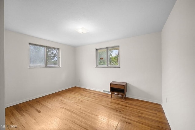 24622 Mitchell Dr, North Olmsted, OH 44070 - spare room with wood finished floors and baseboards